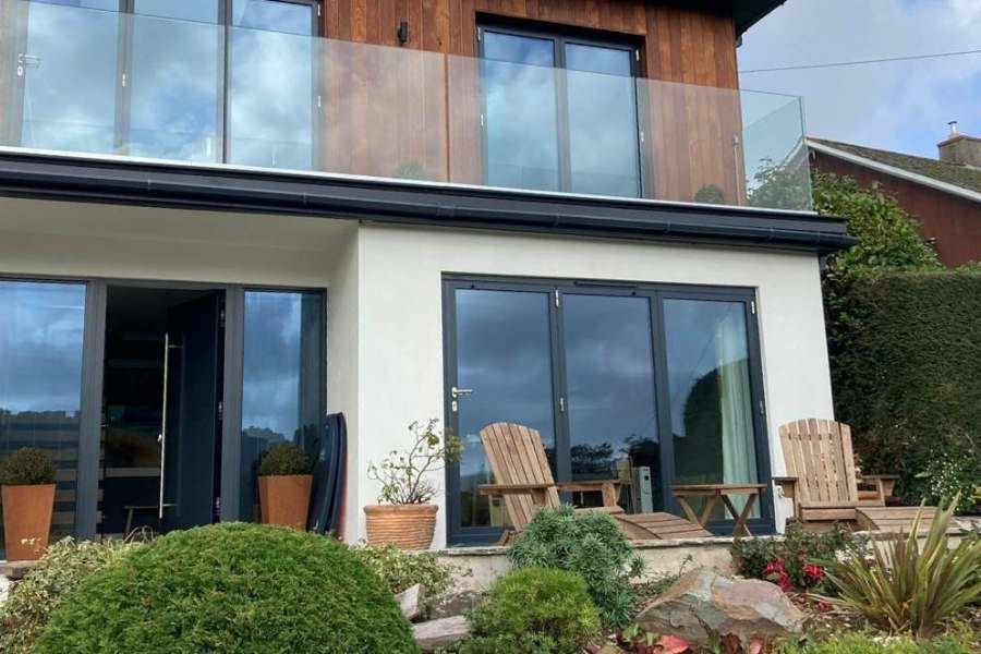Doors Ivybridge - Aluminium Bifold Doors On House - Landmark Windows and Doors Doors Ivybridge - Aluminium Bifold Doors On House - Landmark Windows and Doors